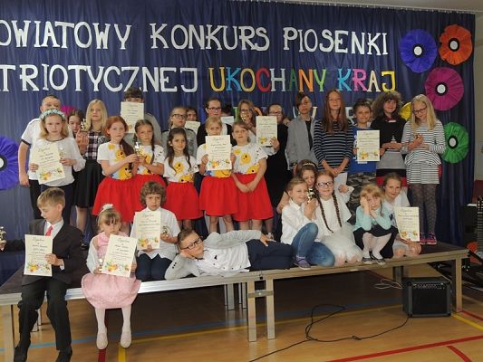  Grafika #26: I POWIATOWY KONKURS PIOSENKI PATRIOTYCZNEJ ,,UKOCHANY KRAJ" grafika